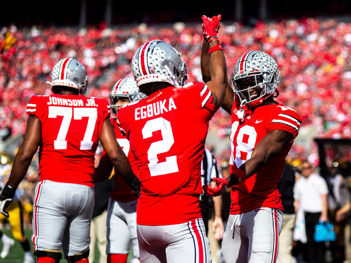 Ohio State’s Marvin Harrison Jr. and Emeka Egbuka celebrate
